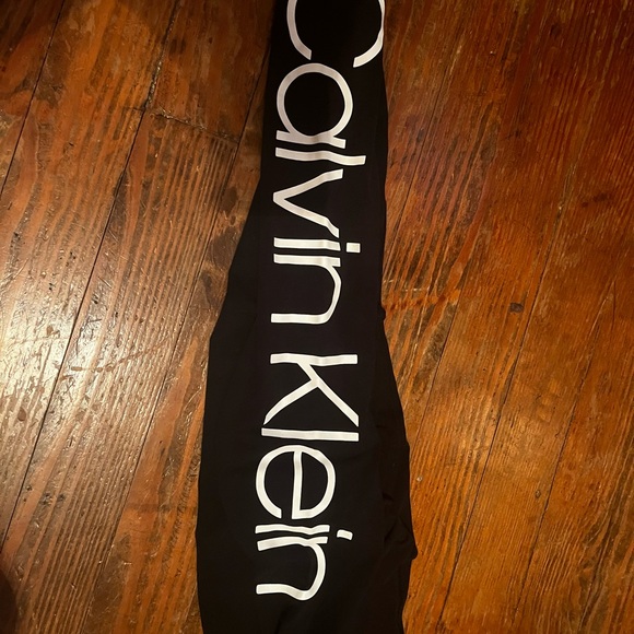 Calvin Klein Black Form-Fitting Pants with Full Length and Side Graphic - Picture 3 of 3
